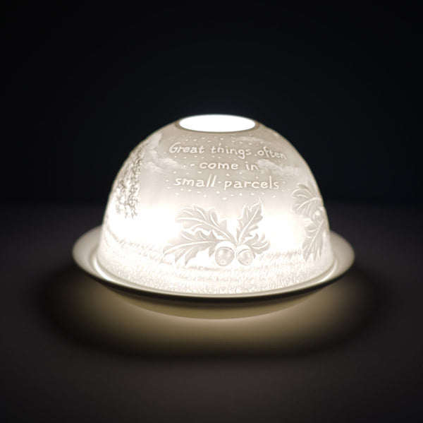 Cello porcelain tealight holder dome, in our acorn design. This design displays the text "great things often come in small packages" with the image of acorns. We offer a wide range of porcelain tealight holders to let you choose your show-stopping piece.
