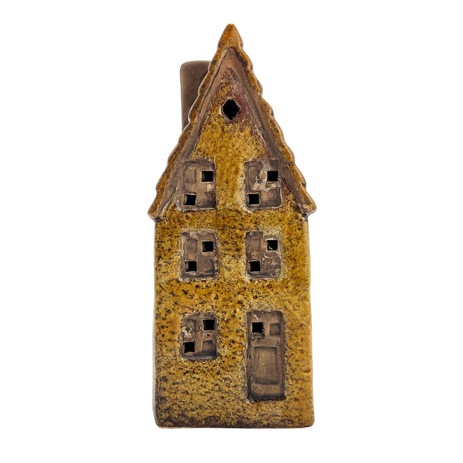 Front view of the Cello Clockmaker’s Haven village pottery house glowing with soft LED light, showcasing detailed brickwork and clock tower design.