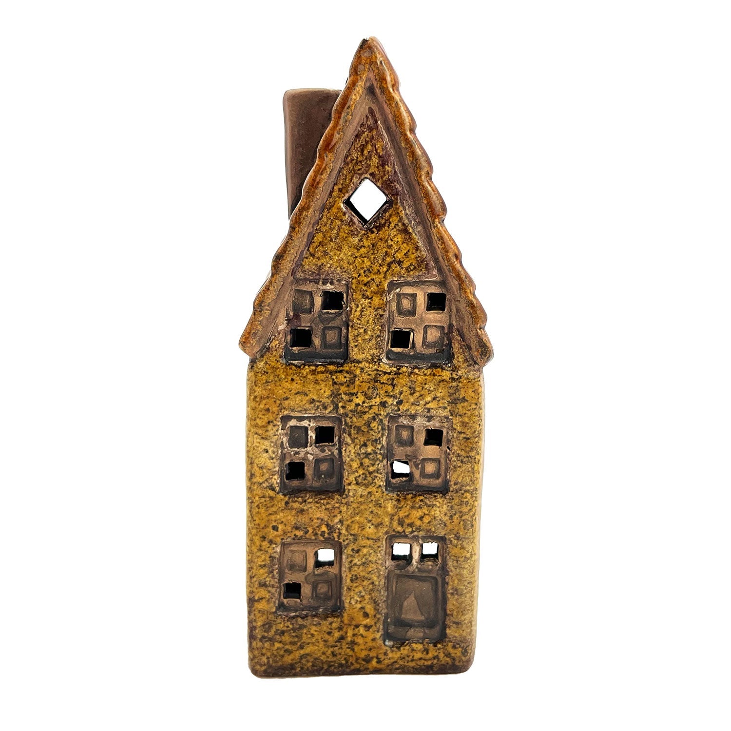 Front view of the Cello Clockmaker’s Haven tealight pottery house illuminated by candlelight, creating a cosy village home atmosphere.