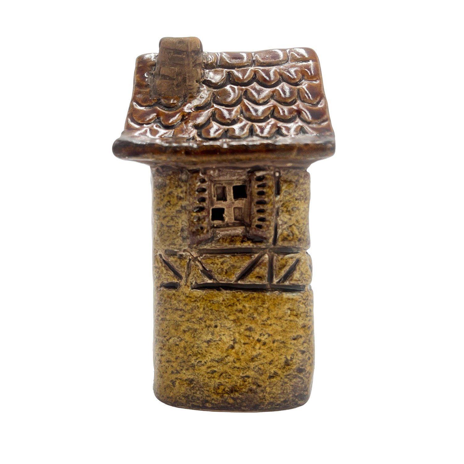 Side angle of the yellow Silk Weaver’s Cottage LED pottery house highlighting its textured roof tiles and vintage architectural design.