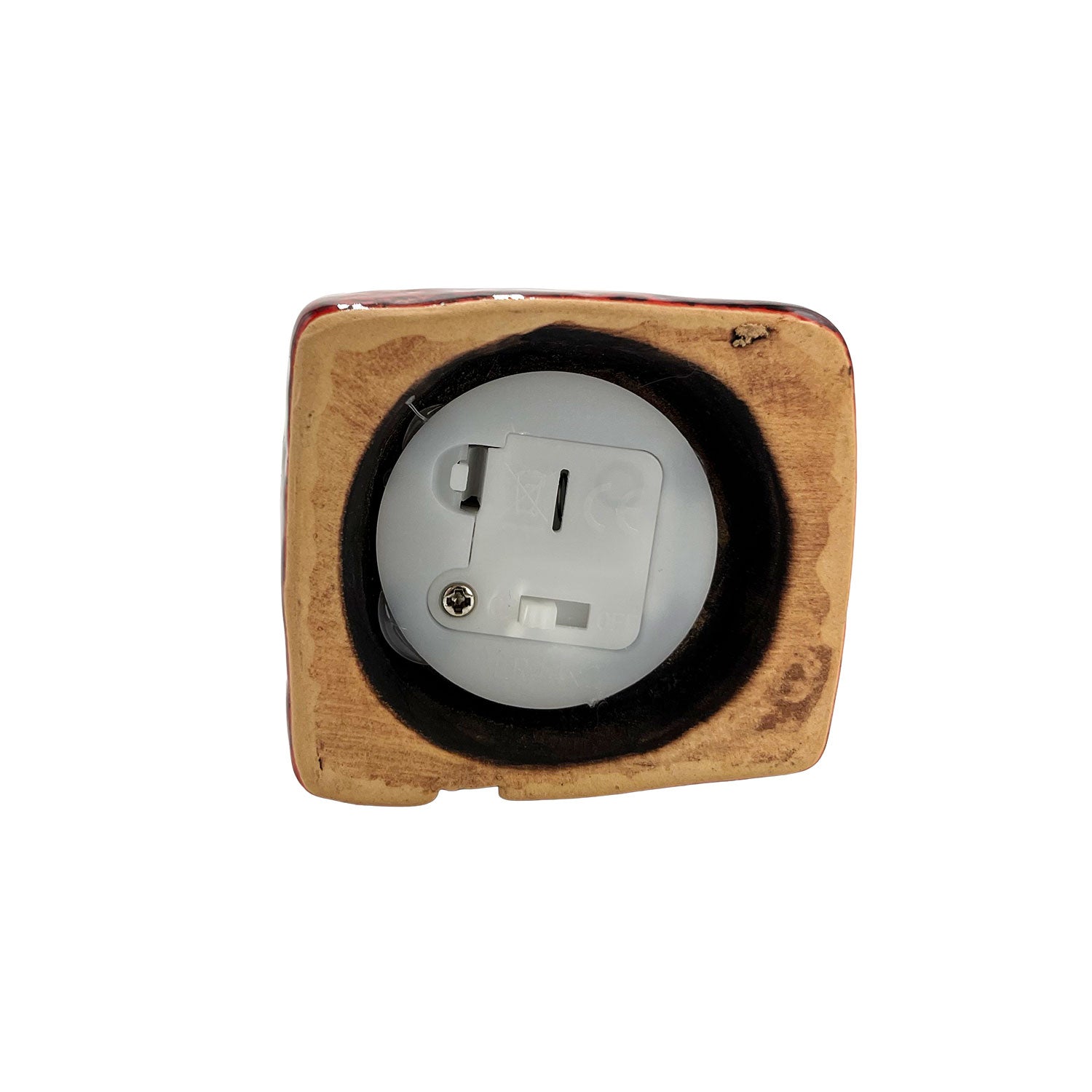 Close-up of the base of the Brackenwood Manor LED pottery house showing the battery compartment and switch design for LED operation.