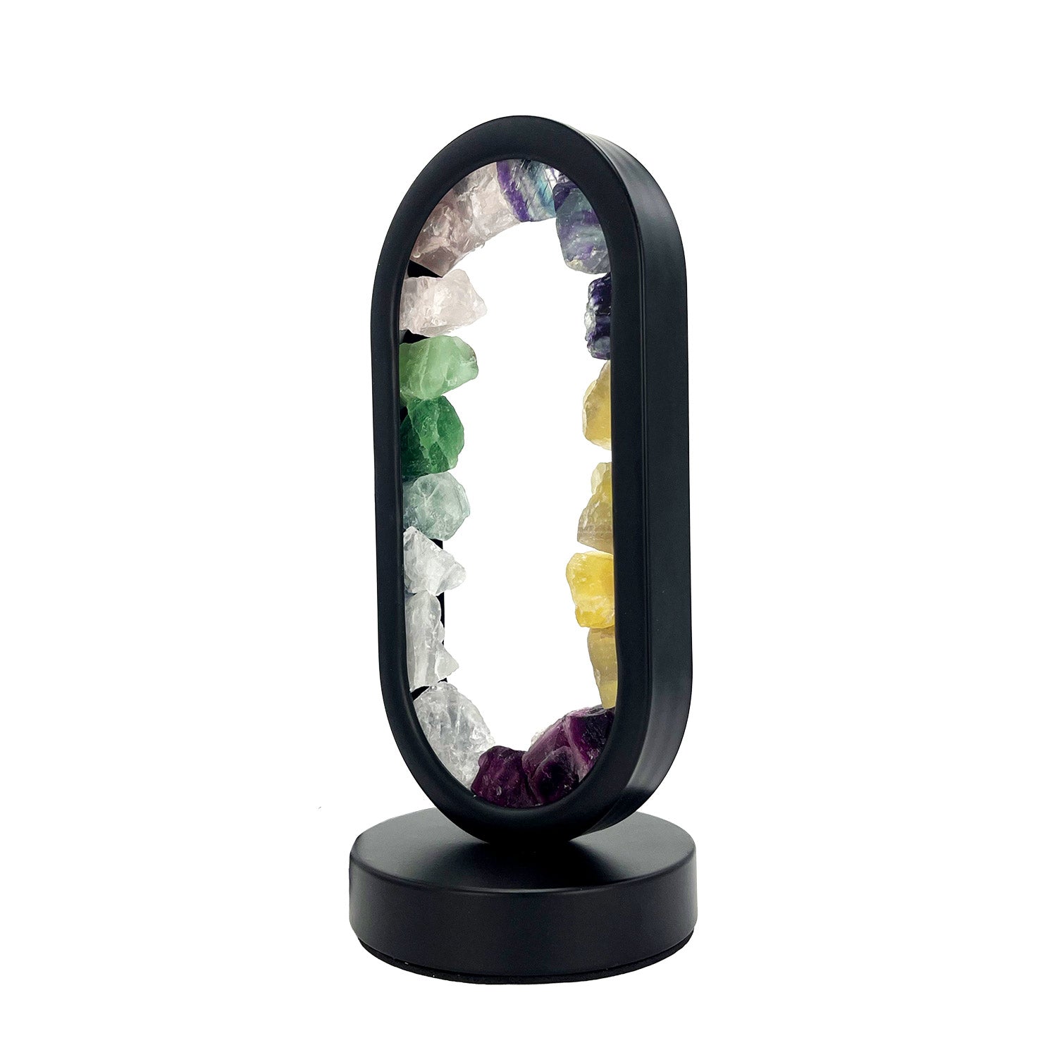 Side view of Gleneagles Oval Earth LED Mixed Minerals Lamp glowing warmly through oval glass, highlighting natural crystal formations and light diffusion.