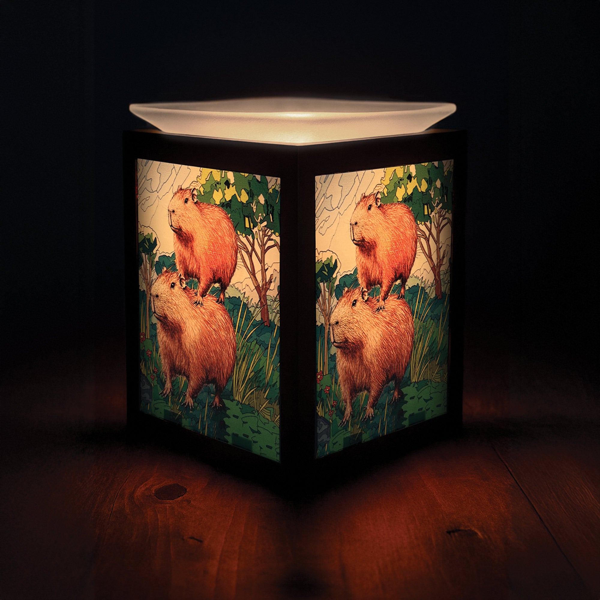 Capybara Electric Wax Melt Burner glowing in a cosy home setting, adding warmth and countryside charm to modern décor