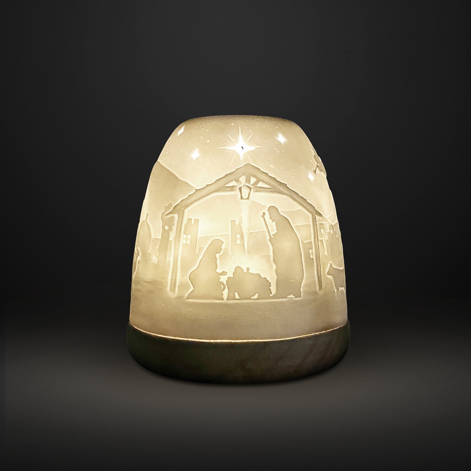 Cello Tall Tealight Dome Nativity glowing in a dark room