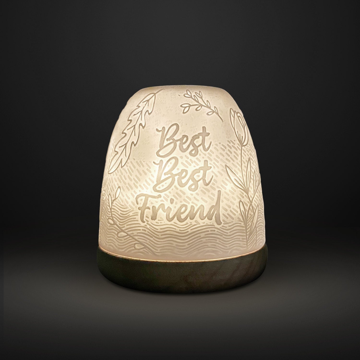 Cello tall tealight dome Best Best Friend design glowing on dark background