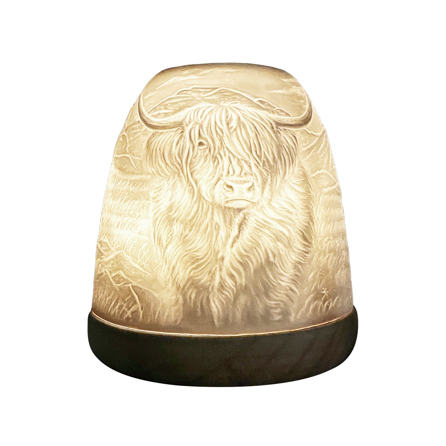 Cello Highland Cow tall porcelain tealight dome shown glowing from side angle