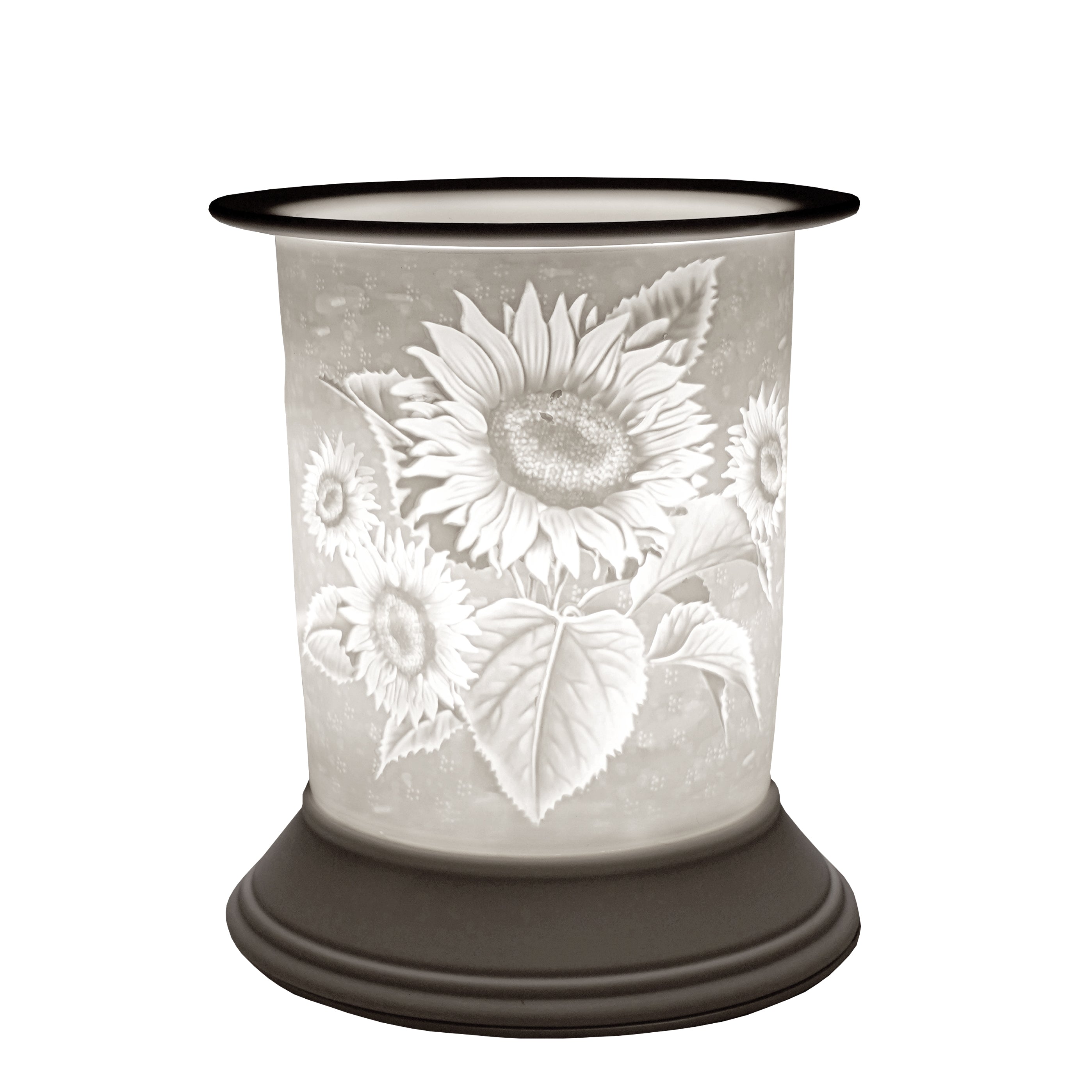 The porcelain material on this Wax Melt Burner allows bright light to shine through it, providing the opportunity to create this bright, warm Summer Time design. This is done by crafting images out of thicker and thinner sections of the porcelain, allowing for detailed shadowing and a 3D effect. The porcelains elegant look will fit perfectly in any room is available in a range of designs and two different shapes.