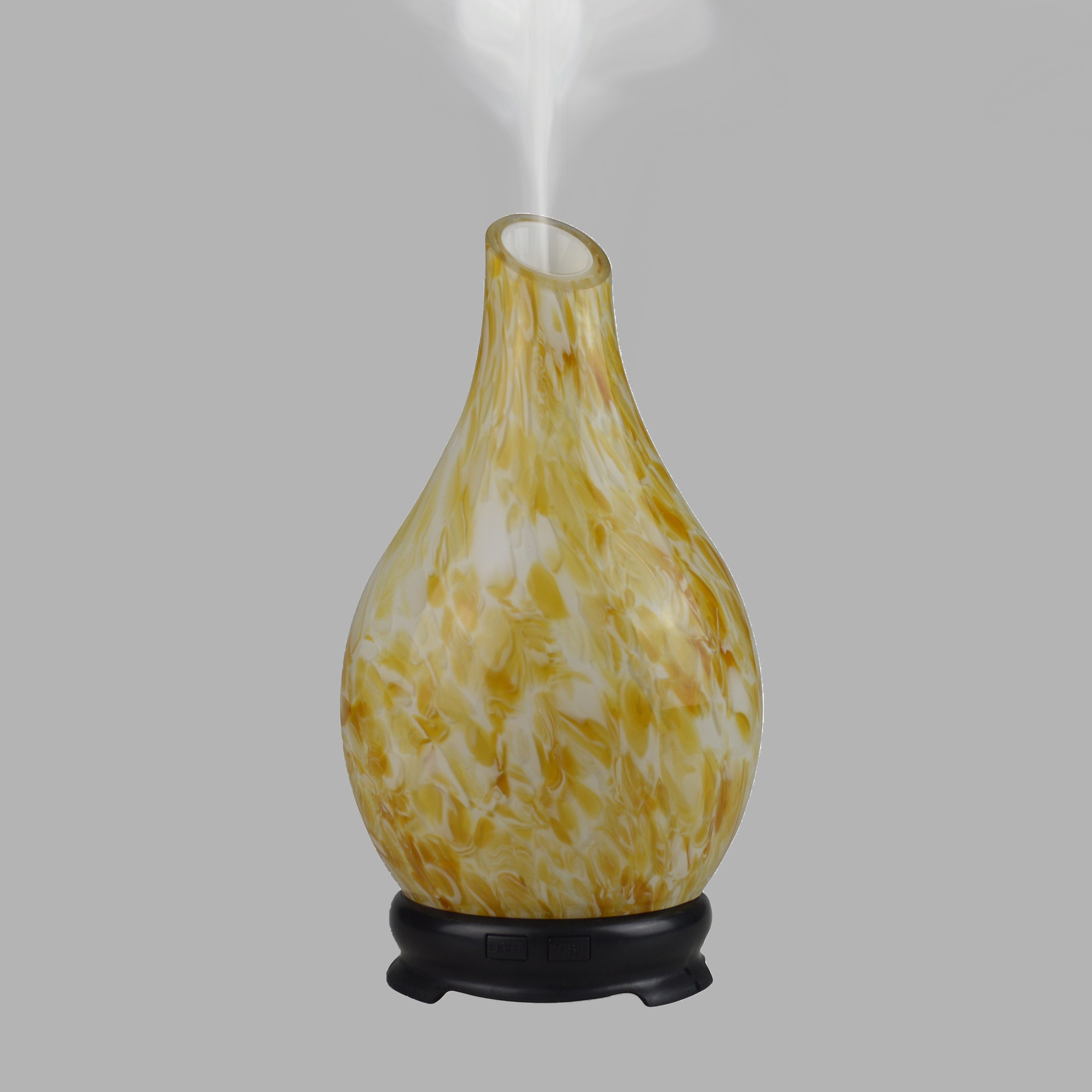 A lovely golden ray shines through when this oil diffuser is turned on, with its fetching design of yellow and white making the perfect summery look, all year-round. 
