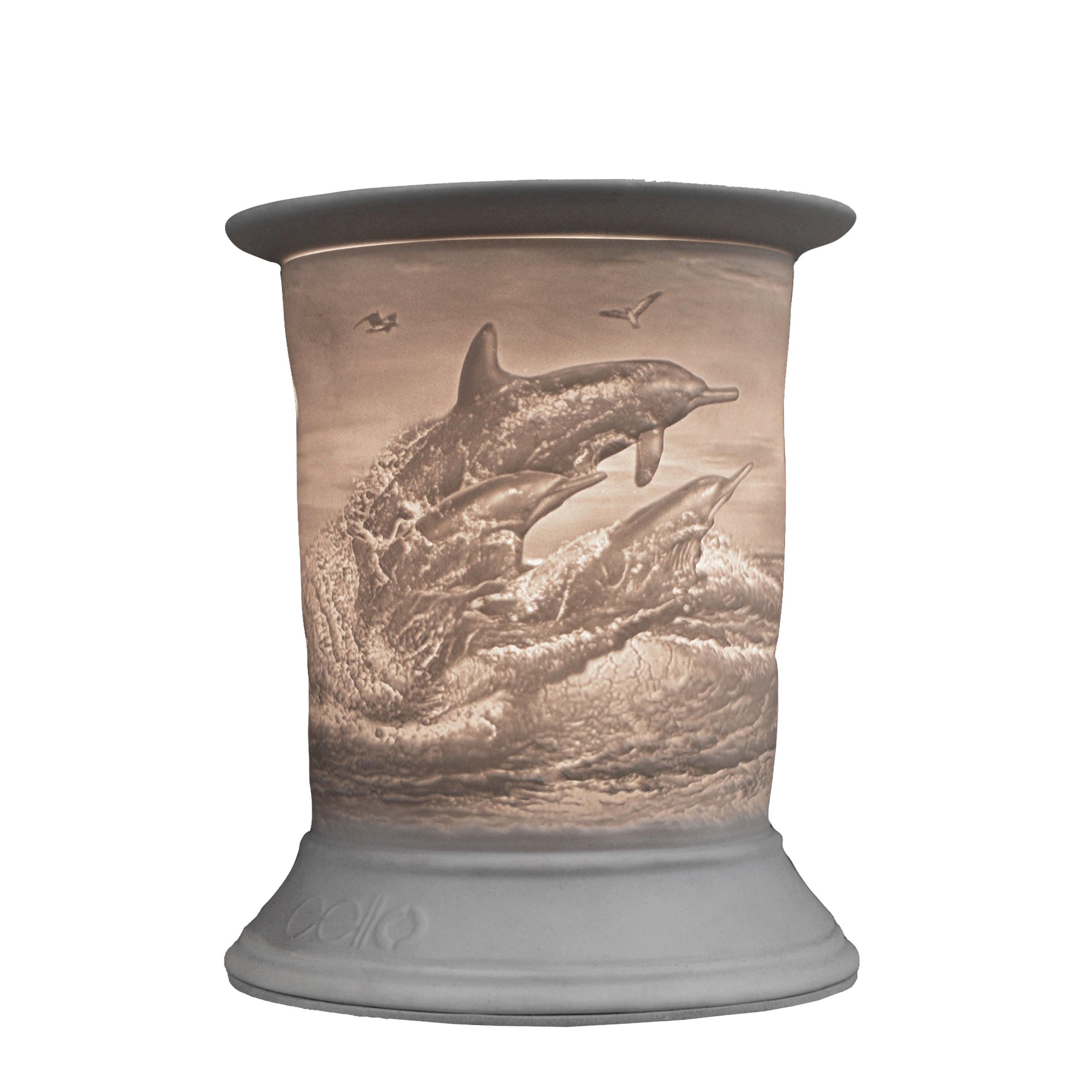The porcelain material on this Wax Melt Burner allows bright light to shine through it, providing the opportunity to create this gorgeous Dolphin design. This is done by crafting images out of thicker and thinner sections of the porcelain, allowing for detailed shadowing and a 3D effect. The porcelains elegant look will fit perfectly in any room is available in a range of designs and two different shapes.